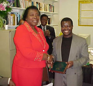 Dr. Oheneba-Sakyi Presents a Plaque from the Departmentto Dr. Small