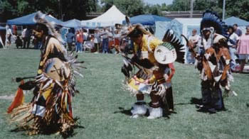 Three American Indian Males Performing a Cultural Dance