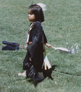 An American Indian Female Child Wearing Cultural Attire 