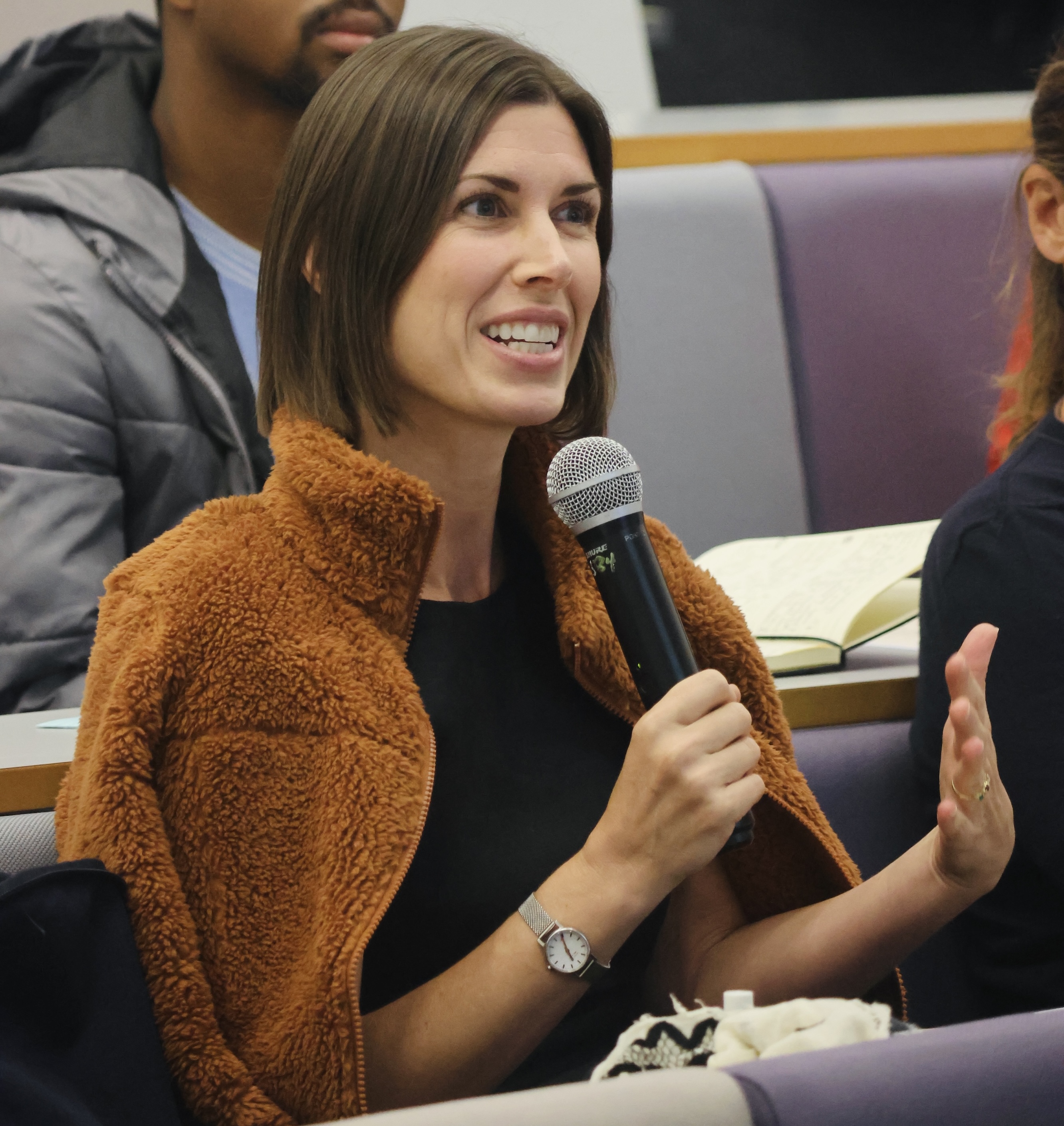 Jessica McKenzie poses a question to a speaker at the Cultural Evolution Society in Durham, UK in September 2024