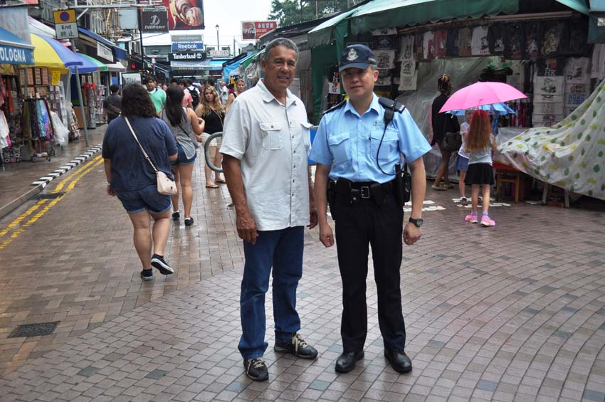 Man Posing with Officer