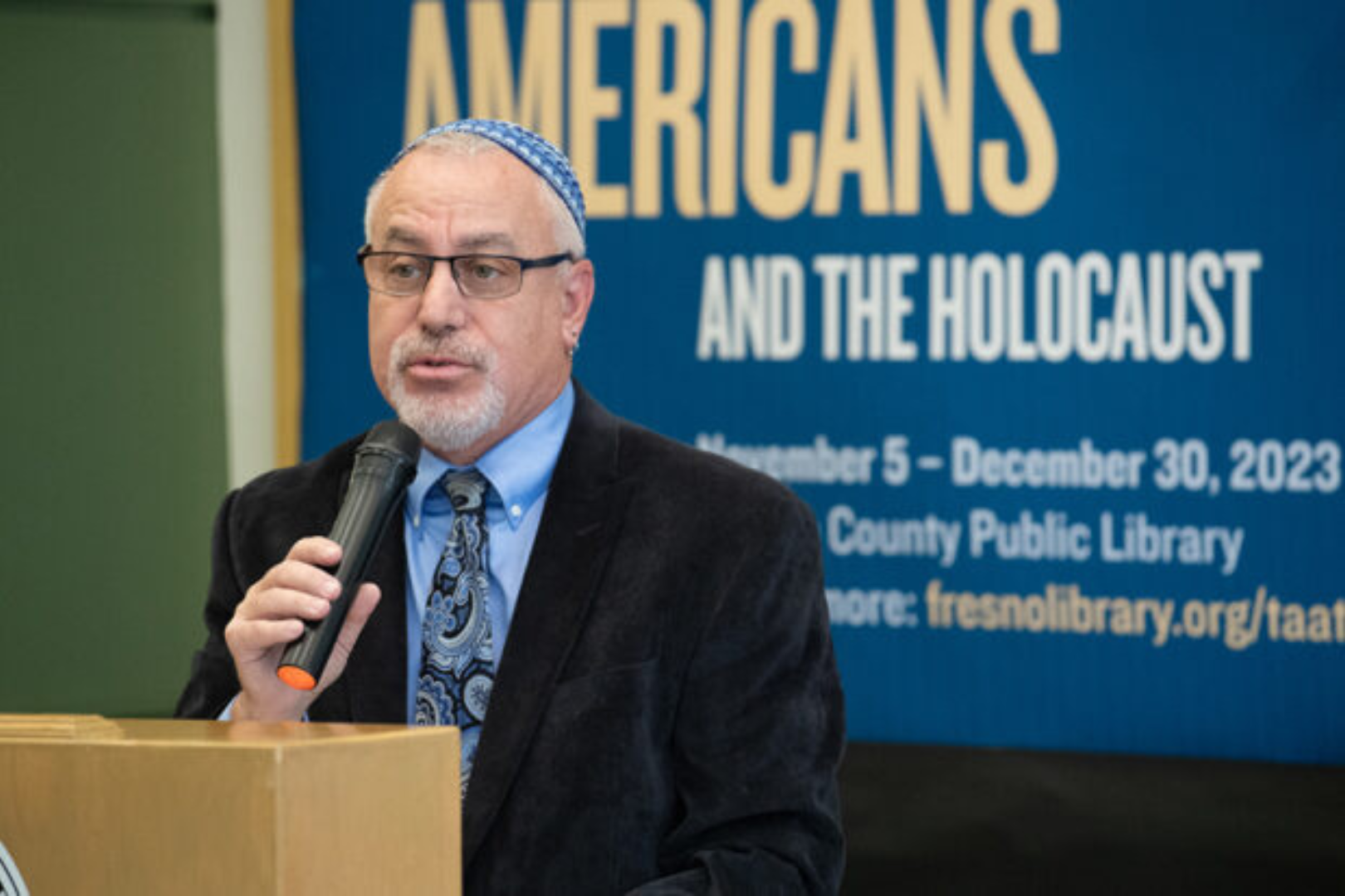 Rabbi Rick Winer speaks at the opening of the “Americans and the Holocaust” exhibit at the Fresno Central Library on Nov. 5. Photo by Peter Maiden